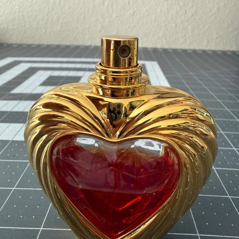 Vintage Victorias Secret Rapture Gold Heart Bottle Cologne Spray 1.7 oz 50ml